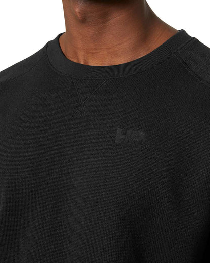 Black coloured Helly Hansen Mens Varde Crewneck on white background 