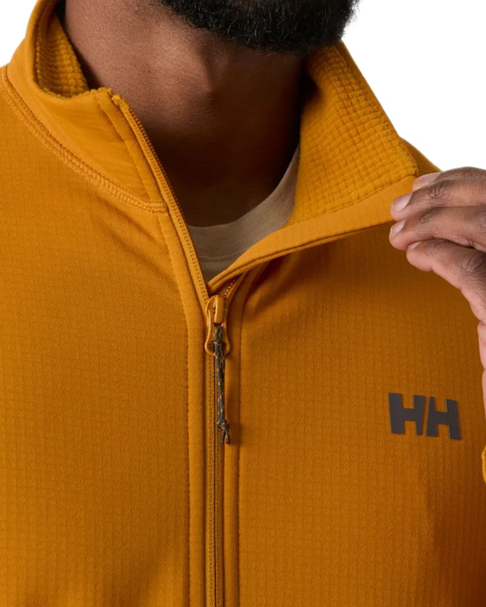 Mustard coloured Helly Hansen Mens Versalite Fleece Jacket on white background 