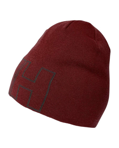 Mars Red Coloured Helly Hansen Outline Beanie on white background 