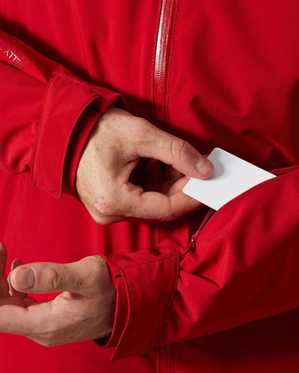 Red Coloured Helly Hansen Panorama 2.0 Insulated Jacket on white background 