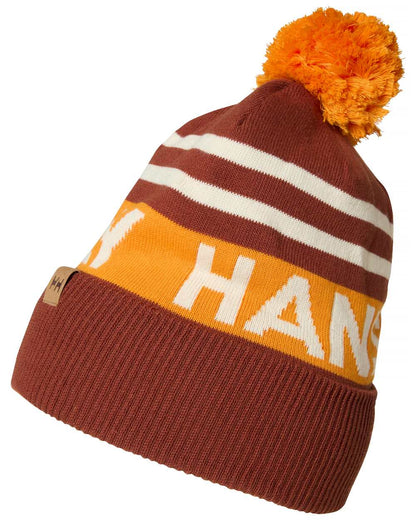 Iron Oxide coloured Helly Hansen Ridgeline Retro Ski Beanie on white background 