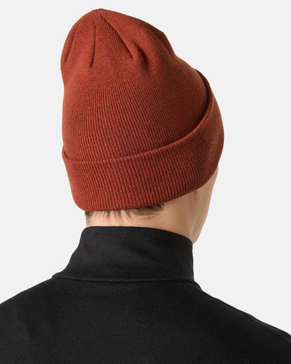 Iron Oxide Coloured Helly Hansen Urban Cuff Beanie on White Background 