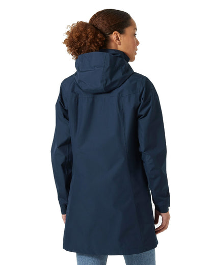 Navy coloured Helly Hansen Womens Aden Long Rain Coat on white background 