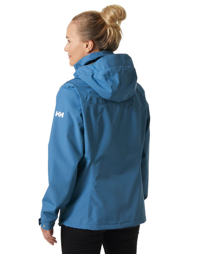 Azurite coloured Helly Hansen Womens Aden Rain Jacket on white background 