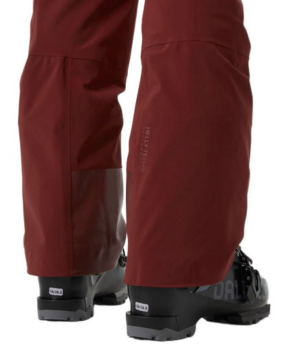 Mars Red Coloured Helly Hansen Womens Alphelia High Waist Insulated Pants on white background 