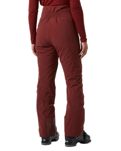 Mars Red Coloured Helly Hansen Womens Alphelia High Waist Insulated Pants on white background 