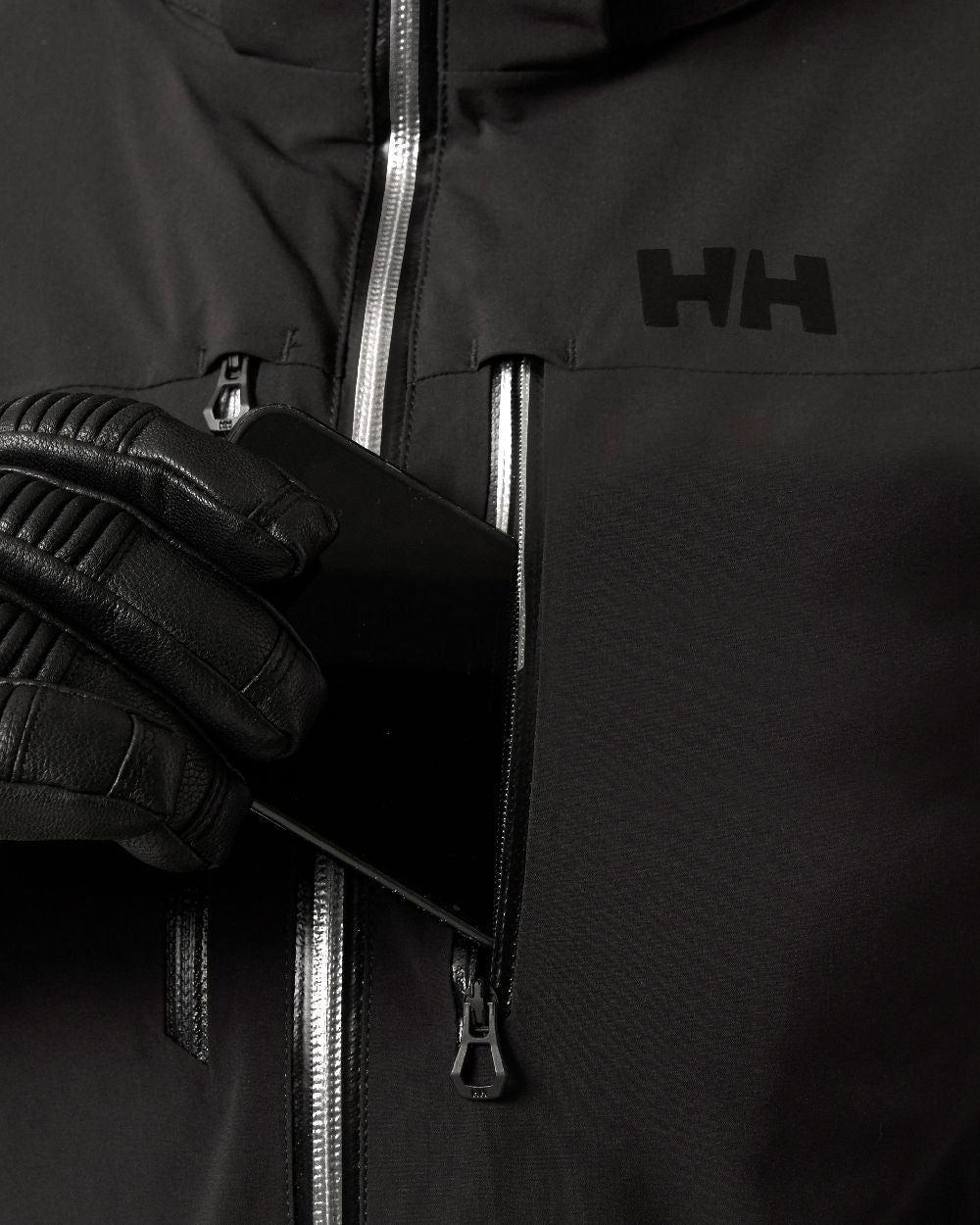 Black Coloured Helly Hansen Womens Alphelia Lifaloft Ski Jacket on white background 