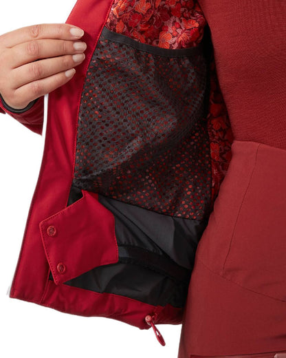 Red Coloured Helly Hansen Womens Alphelia Lifaloft Ski Jacket on white background 