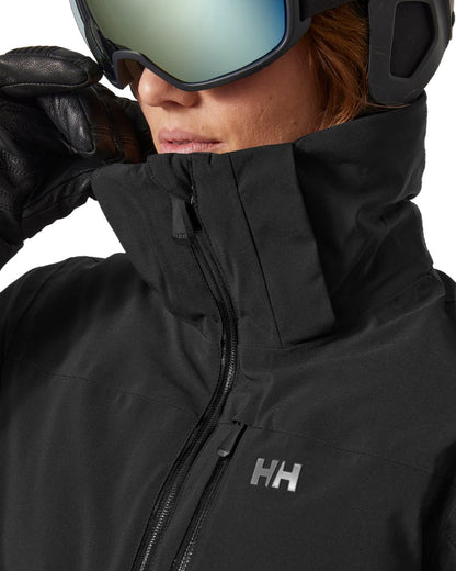 Black Coloured Helly Hansen Womens Alphelia Ski Jacket on white background 