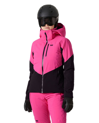 Dragon Fruit Black Coloured Helly Hansen Womens Alphelia Ski Jacket on white background 