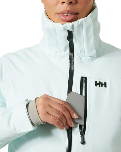 Icicle Coloured Helly Hansen Womens Alphelia Ski Jacket on white background 