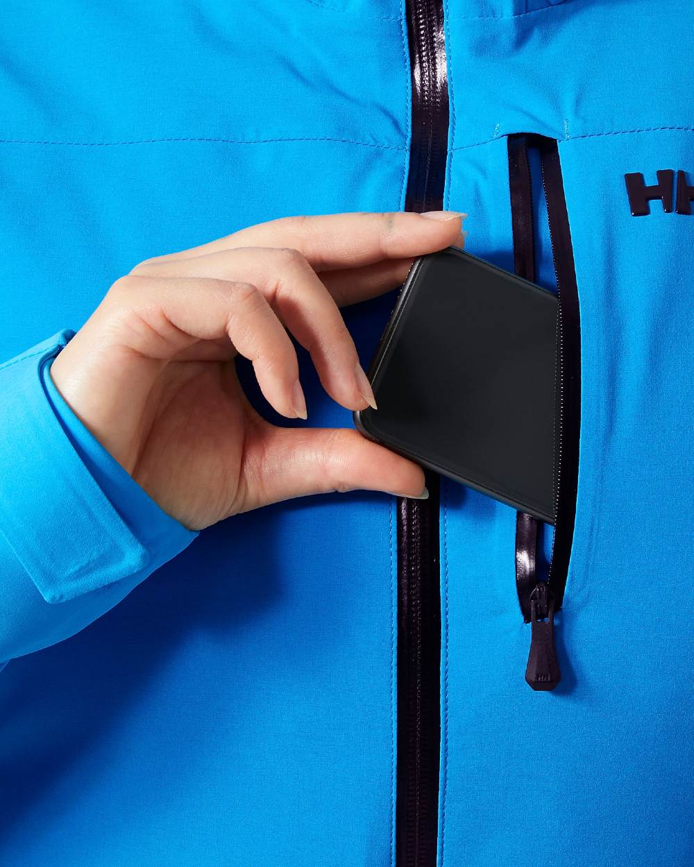 Neptune Blue Coloured Helly Hansen Womens Alphelia Ski Jacket on white background 