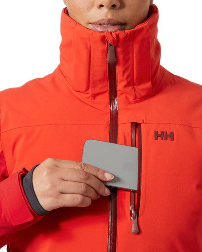 Red Coloured Helly Hansen Womens Alphelia Ski Jacket on white background 