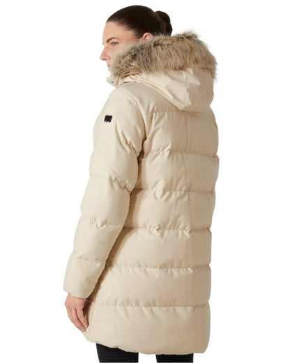 Cream Coloured Helly Hansen Womens Blossom Puffy Winter Parka on white background 