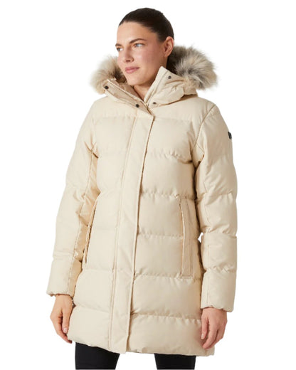 Cream Coloured Helly Hansen Womens Blossom Puffy Winter Parka on white background 