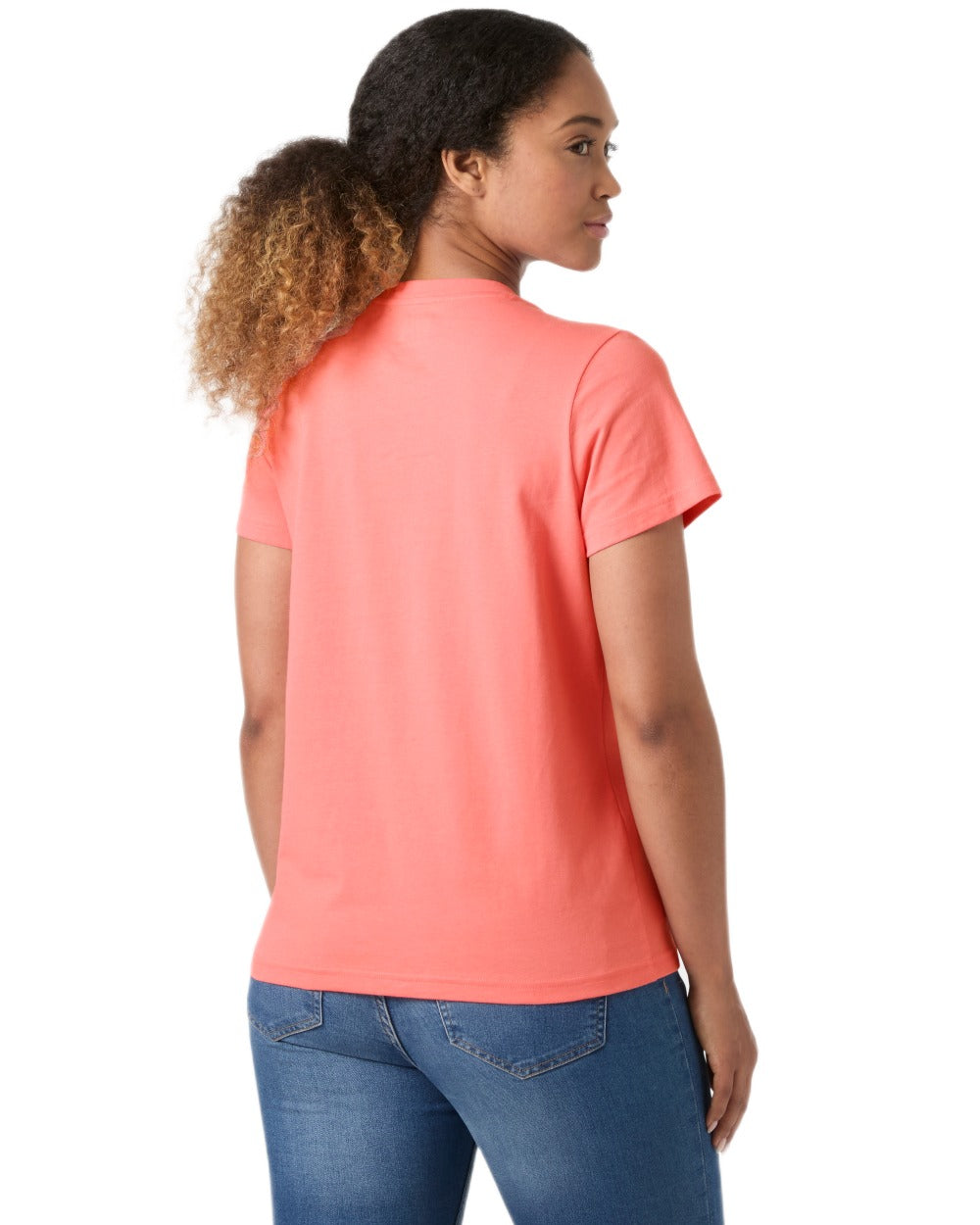 Coral Almond coloured Helly Hansen Womens Core Graphic T-Shirt 2.0 on white background 