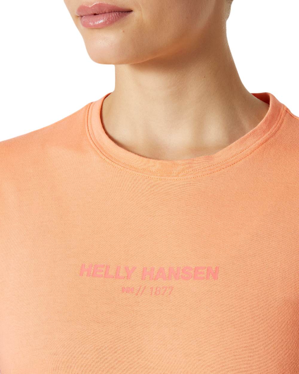 Melon coloured Helly Hansen Womens Core T-Shirt 2.0 on white background 