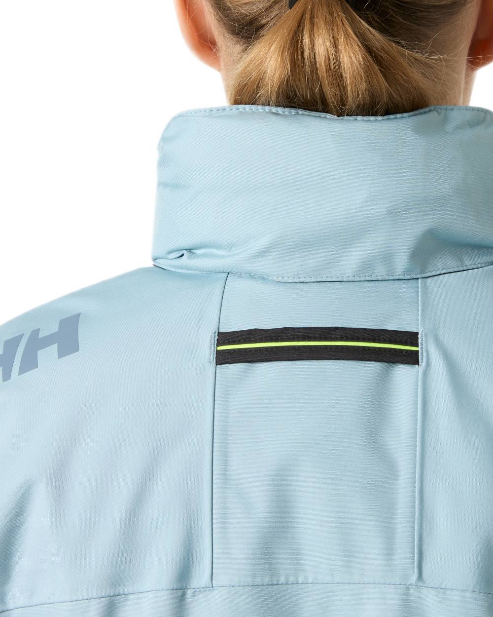 Windy Blue Coloured Helly Hansen Womens Crew Hooded Midlayer Sailing Jacket 2.0 On A White Background 