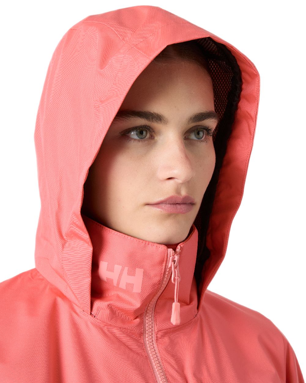 Sunset Pink Coloured Helly Hansen womens crew hooded sailing jacket 2.0 on white background 