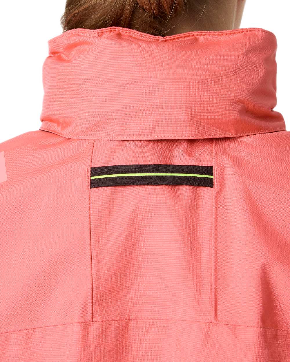 Sunset Pink Coloured Helly Hansen womens crew hooded sailing jacket 2.0 on white background 