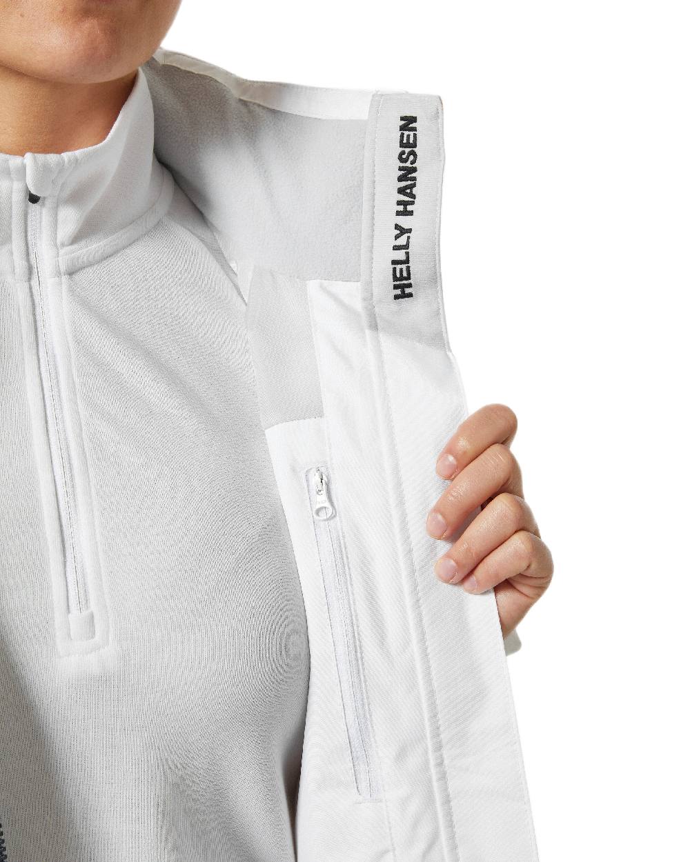 White Coloured Helly Hansen womens crew hooded sailing jacket 2.0 on white background 