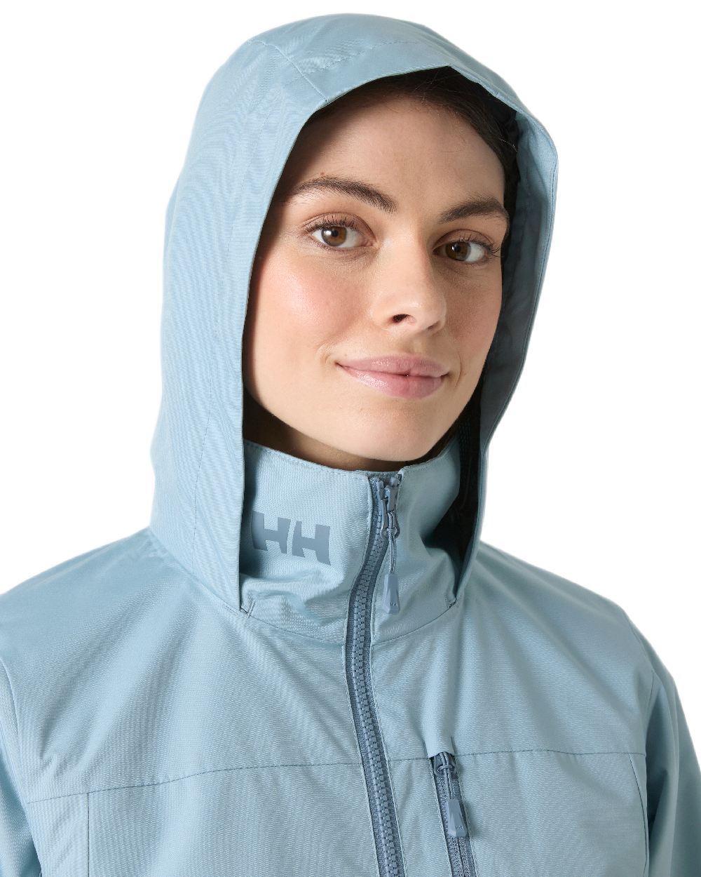 Windy Blue Coloured Helly Hansen womens crew hooded sailing jacket 2.0 on white background 