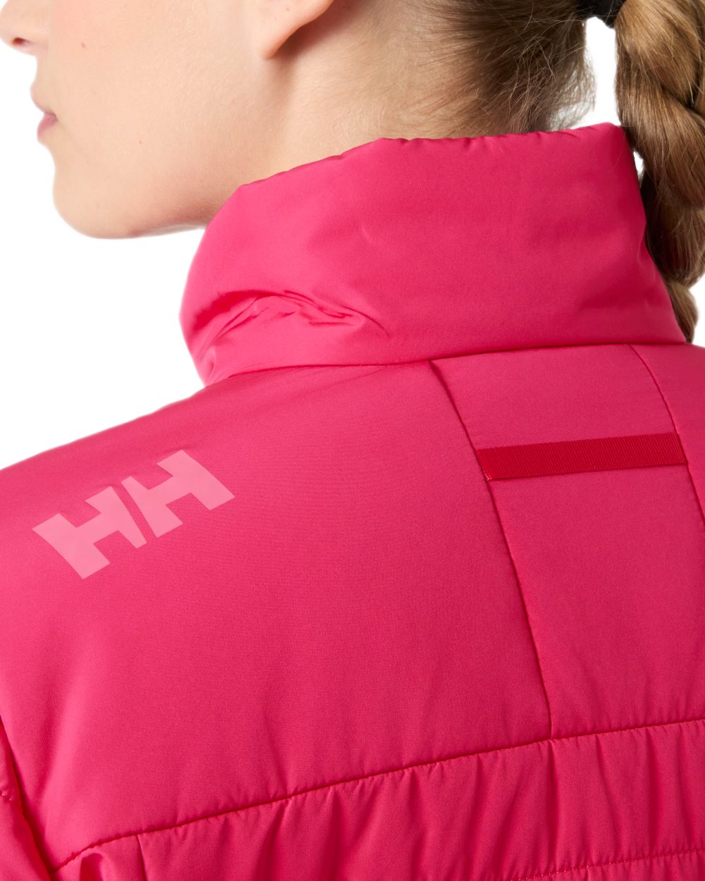 Cranberry coloured Helly Hansen Womens Crew Insulated Sailing Jacket 2.0 on white background 