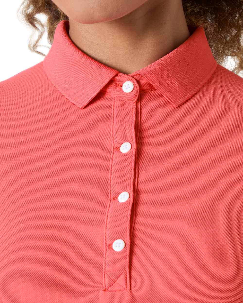 Sunset Pink coloured Helly Hansen Womens Crewline Polo on White background 