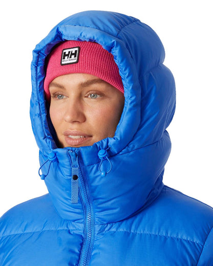 Ultra Blue Coloured Helly Hansen Womens Essence Down Jacket on white background 