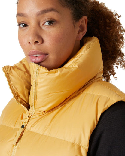 Sand Coloured Helly Hansen Womens Essence Down Vest on white background 