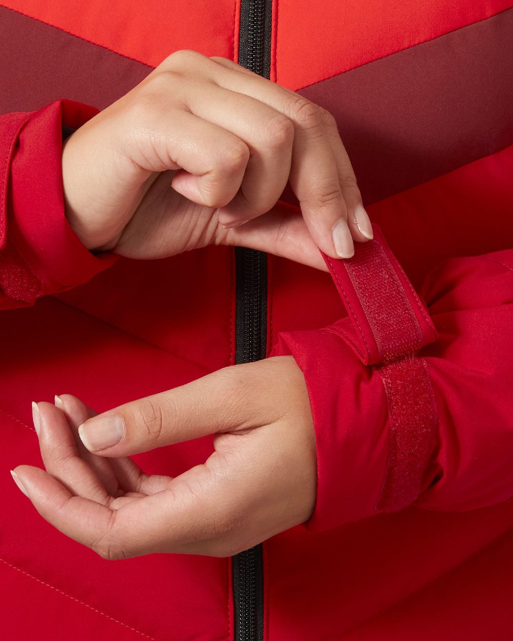 Mars Red Coloured Helly Hansen Womens Imperial Puffy 2.0 Jacket on white background 