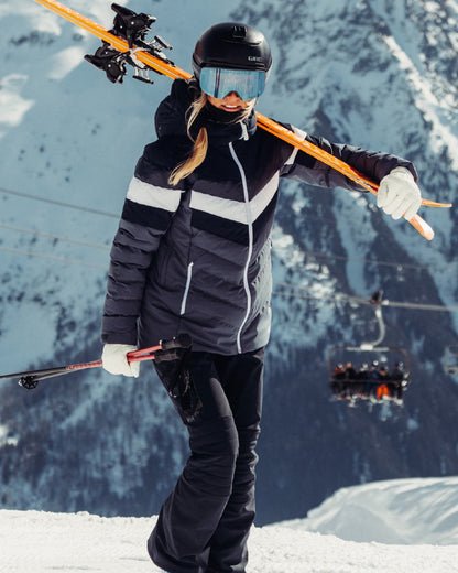 Navy Coloured Helly Hansen Womens Imperial Puffy 2.0 Jacket on mountain background 