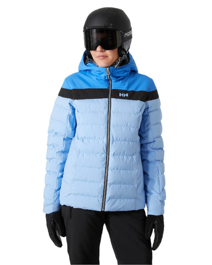 Bright Blue Coloured Helly Hansen Womens Imperial Puffy Jacket on white background 