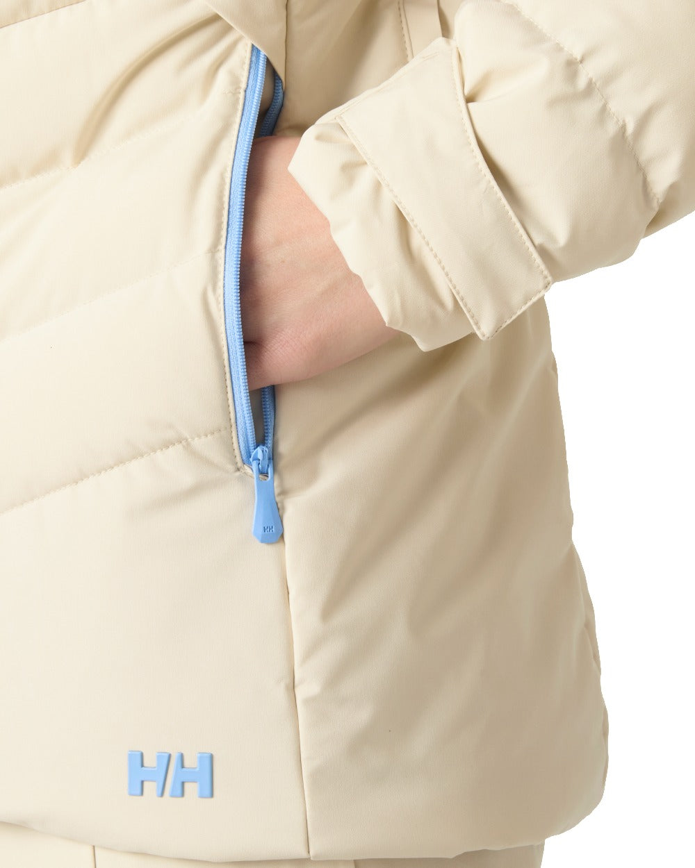 Cream Coloured Helly Hansen Womens Imperial Puffy 2.0 Jacket on white background 