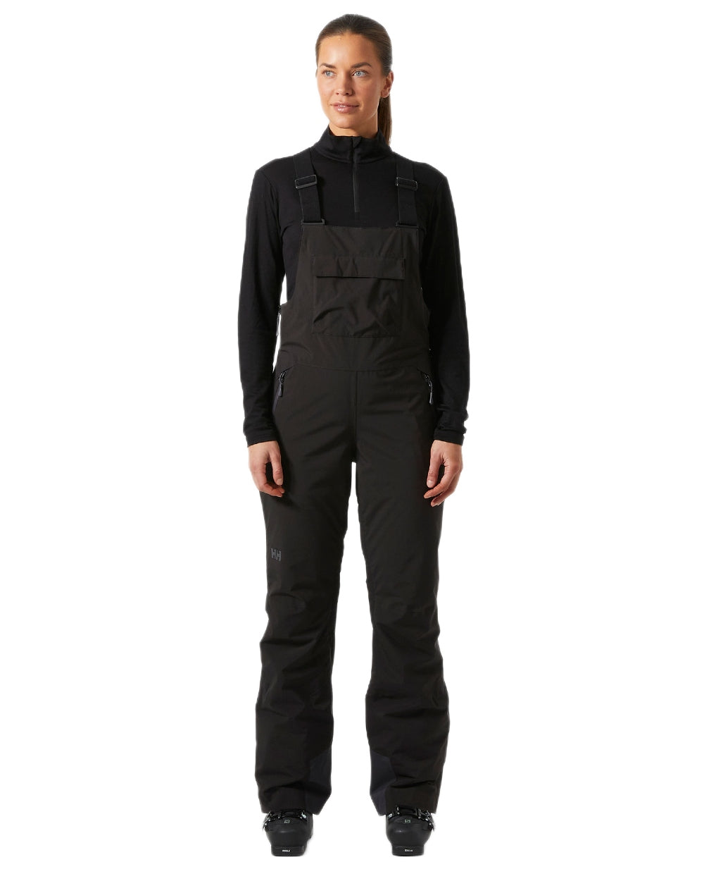 Black Coloured Helly Hansen Womens Legendary Insulated Bib Pants on white background 