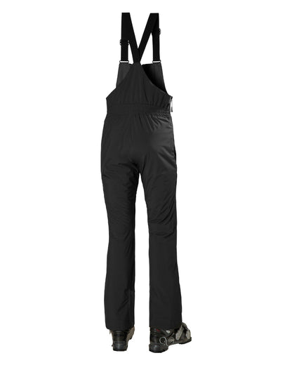 Black Coloured Helly Hansen Womens Legendary Insulated Bib Pants on white background 