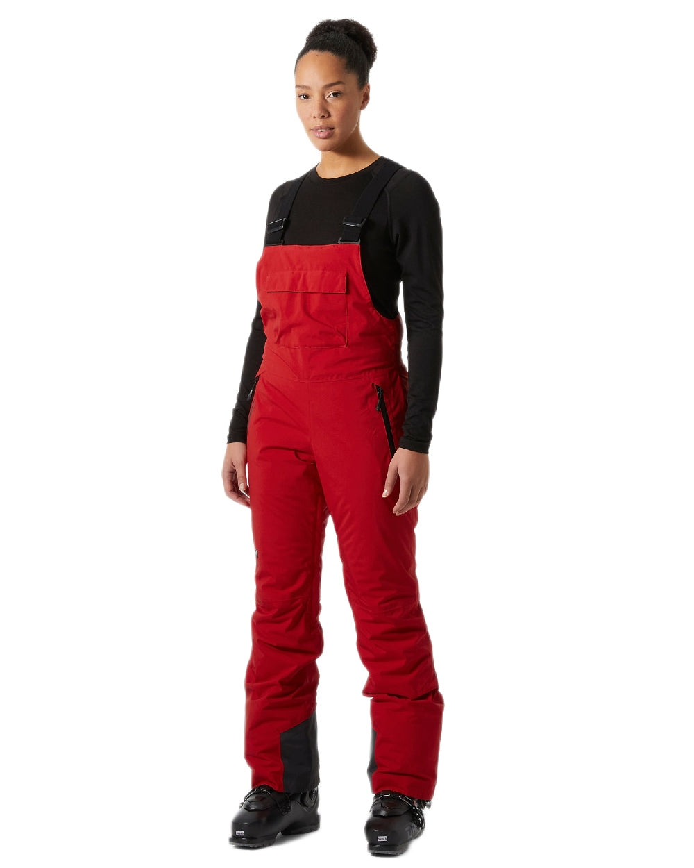 Red Coloured Helly Hansen Womens Legendary Insulated Bib Pants on white background 