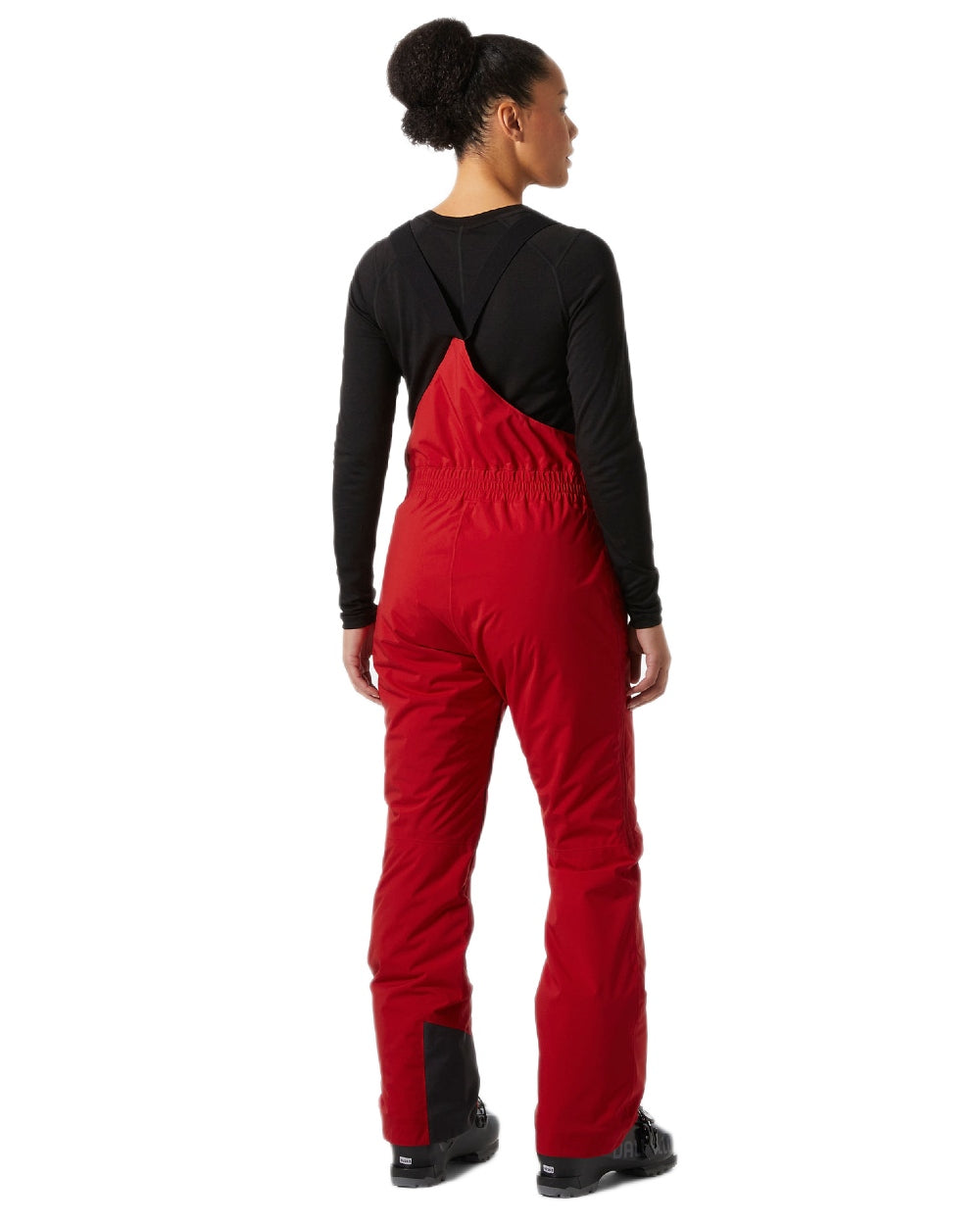 Red Coloured Helly Hansen Womens Legendary Insulated Bib Pants on white background 