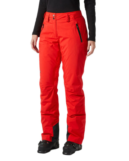 Alert Red Coloured Helly Hansen Womens Legendary Insulated Ski Pants on white background 