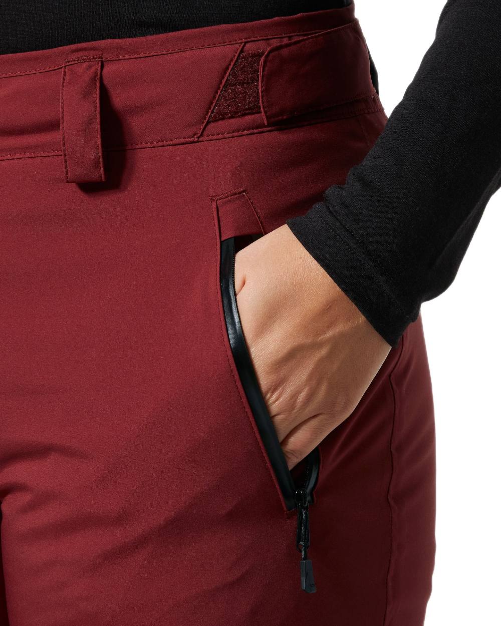Mars Red Coloured Helly Hansen Womens Legendary Insulated Ski Pants on white background 