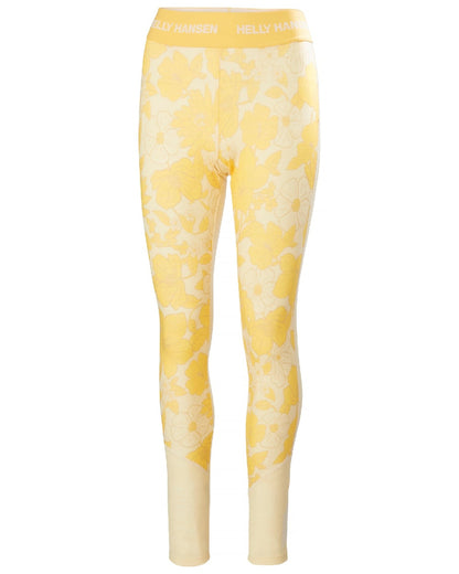 Yellow Cream Floral Aop Coloured Helly Hansen Womens Lifa Merino Midweight Graphic Base Layer Pants on white background 