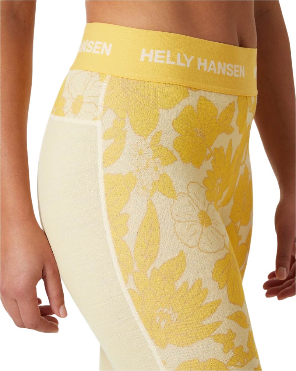 Yellow Cream Floral Aop Coloured Helly Hansen Womens Lifa Merino Midweight Graphic Base Layer Pants on white background 