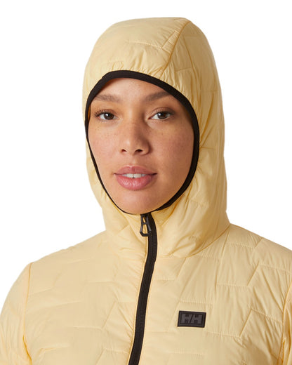 Yellow Cream Coloured Helly Hansen Womens Lifaloft Hooded Insulated Jacket on white background 