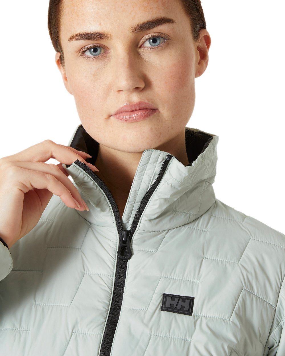 Green Mist Coloured Helly Hansen Womens Lifaloft Insulator Jacket on white background 