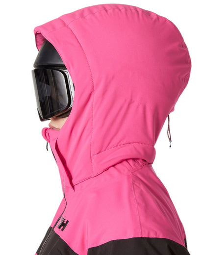 Dragon Fruit Coloured Helly Hansen Womens Motionista Lifaloft Ski Jacket on white background 