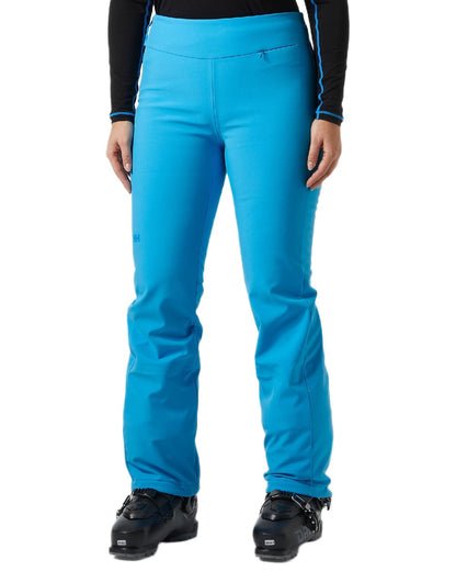 Cyan Coloured Helly Hansen Womens Nora Softshell Pants on white background 