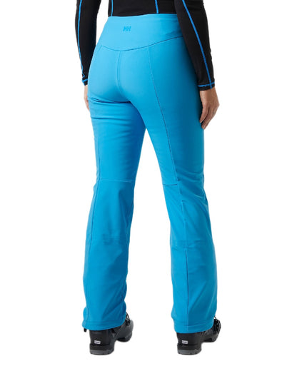 Cyan Coloured Helly Hansen Womens Nora Softshell Pants on white background 