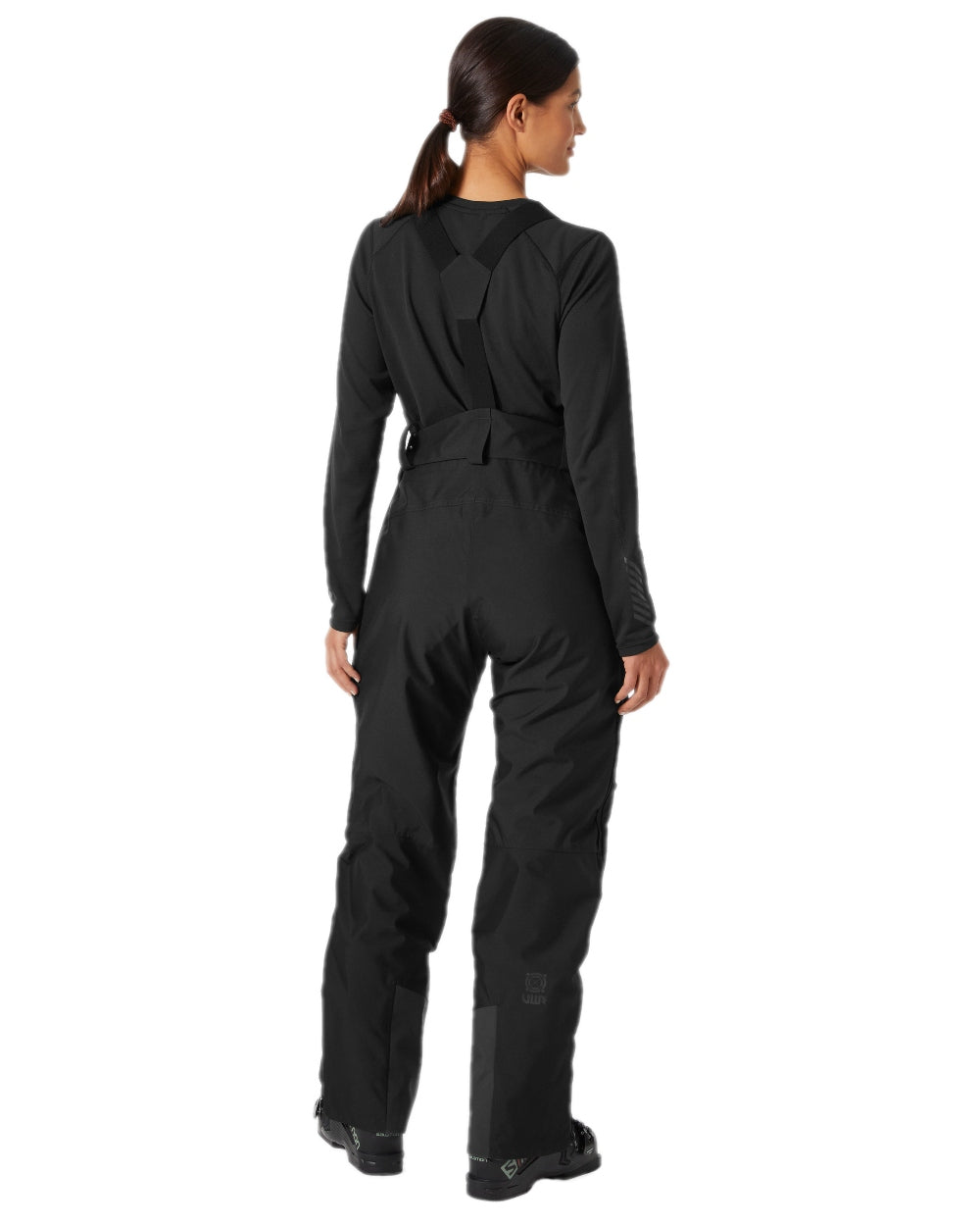 Black Coloured Helly Hansen Womens Powderqueen Bib Pant on white background 