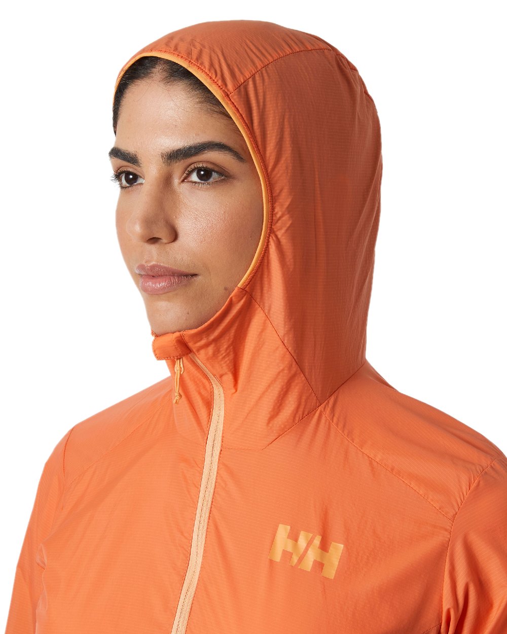Bonfire coloured Helly Hansen Womens Roam Wind Anorak on white background 