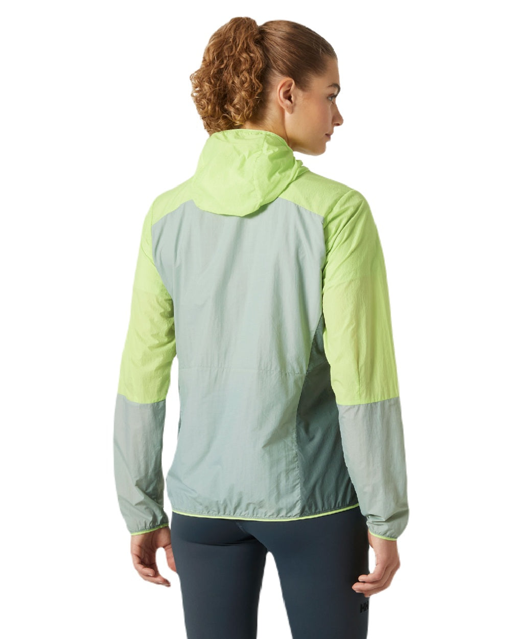 Sharp Green coloured Helly Hansen Womens Roam Wind Anorak on white background 